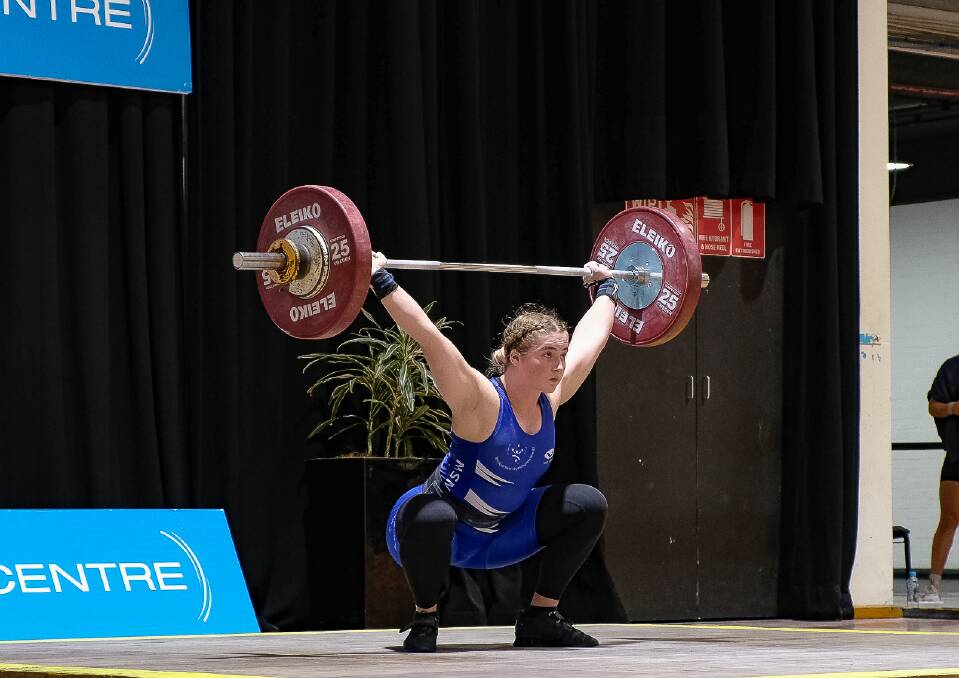 LIFT: Jae Daly completed a snatch at the senior state championships. Photo: SUPPLIED 