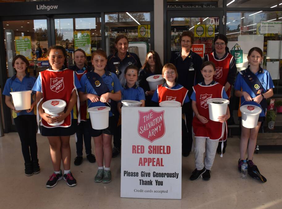 RED SHIELD APPEAL: Front row- Alexandrah Norman, Layla Philipsen, Summer Caine, June-Maree Mitchell, Kate Rollason. Back row- Jamie Zeizinger, Lena Parkes, Francie Laurenson (leader), Ashleigh Turrell, Cheryl Rutherford (leader), Marissa Dirks (leader) and Mikayla Hutchison. Pictures: CIARA BASTOW