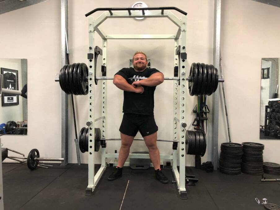 James Perry smiles at the constant improvements that he has been making during his powerlifting training. Picture: SUPPLIED. 