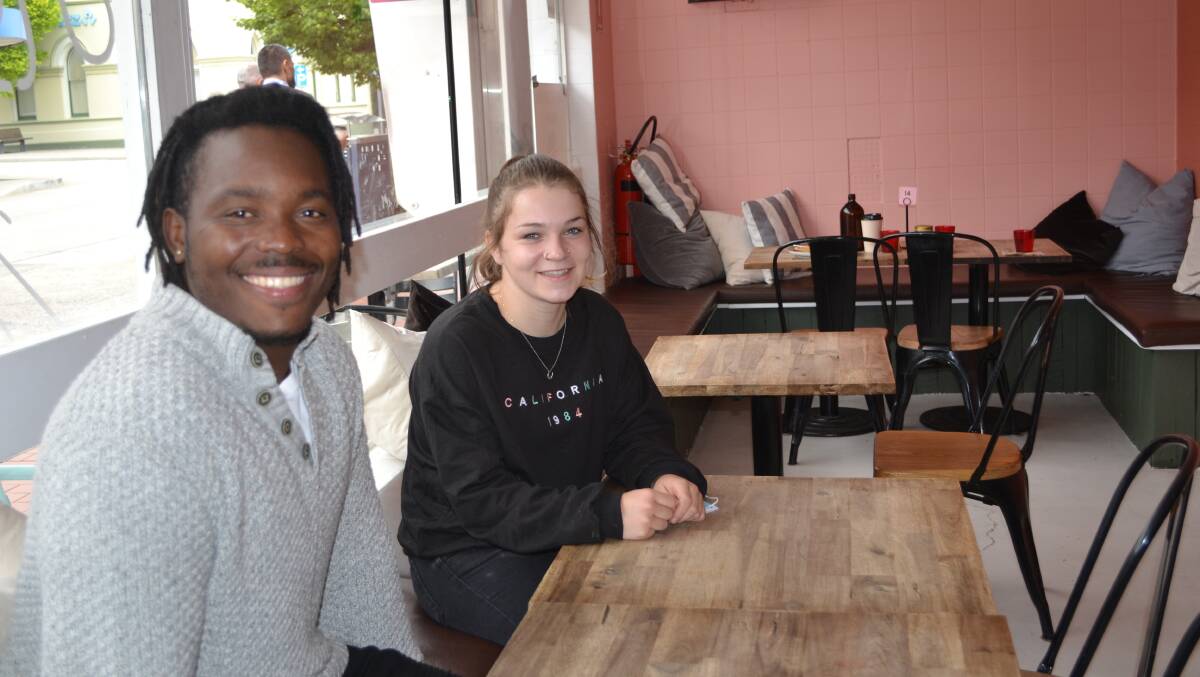 A HOME AWAY FROM HOME: Hometown Cafe owner Jacques Seliscar with employee Abbey Kirby. Picture: CIARA BASTOW 