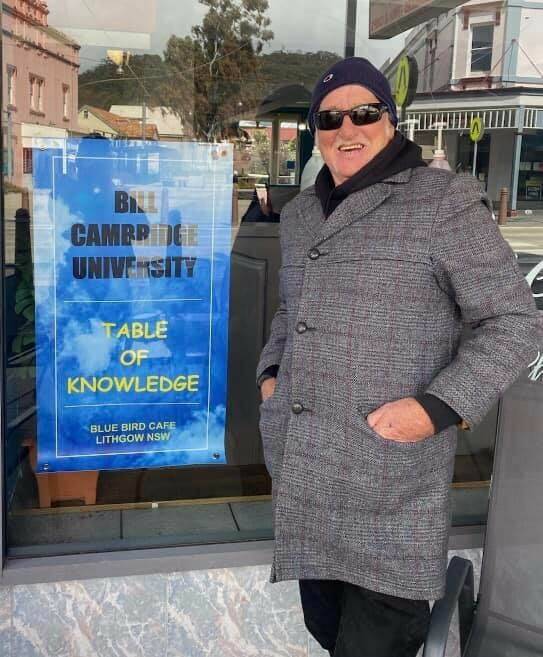 Billy Cambridge and his new university poster. Picture: SUPPLIED