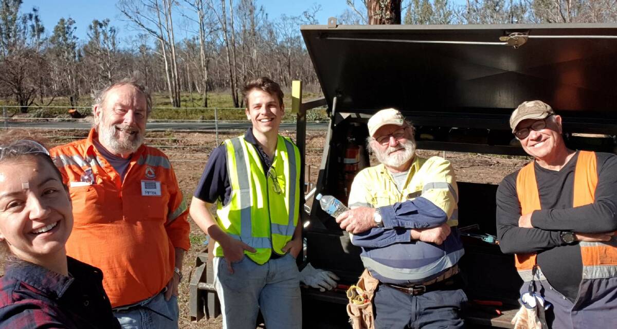 VOLUNTEERS: The BlazeAid volunteers down at Running Stream helping mend fences for those after the bushfires earlier this year. Picture: SUPPLIED