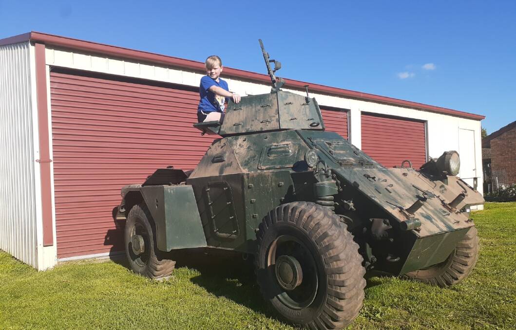 WHAT A MACHINE: Tilly in Wayne's new Ferret Scout car. Photo: SUPPLIED 