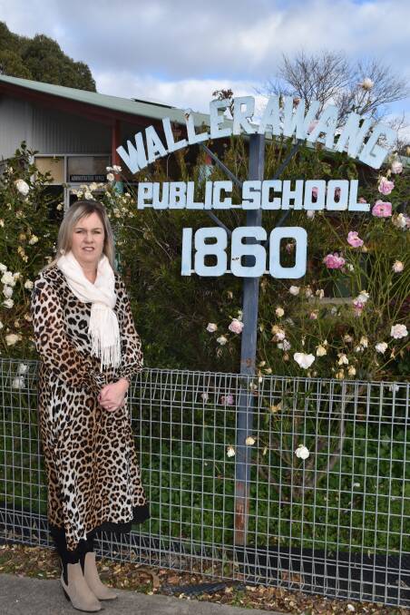 Jenny Lamborn stands proudly in front of Wallerawang Public School. Picture: SUPPLIED. 