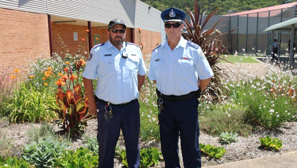 GREEN THUMBS: Lithgow Correctional Centre Intel manager Arthur Wright and Governor Mick Dudley in front of a garden looked after by inmates.Picture: TROY WALSH