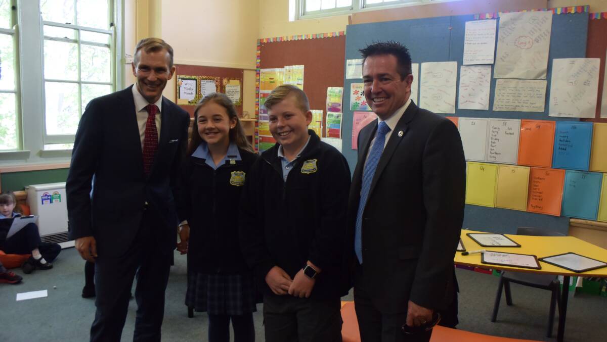 Educational minister Rob Stokes with school captains and MP Paul Toole. 