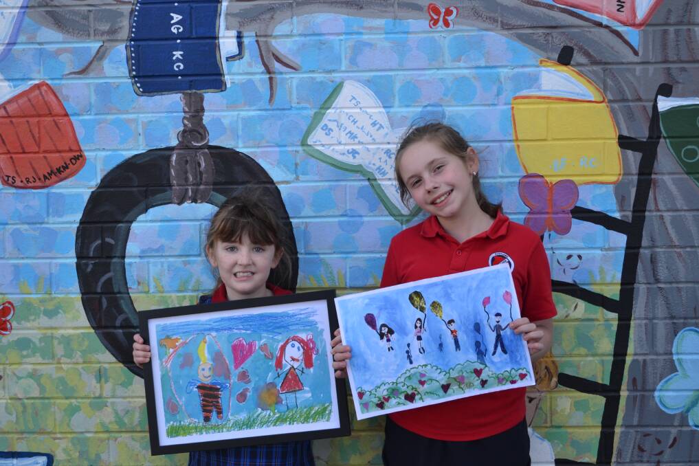 ARTISTS: Mackenzie Robertson and Olivia Evans had their artworks selected for awards in Operation Art Exhibition. Photo: CIARA BASTOW 
