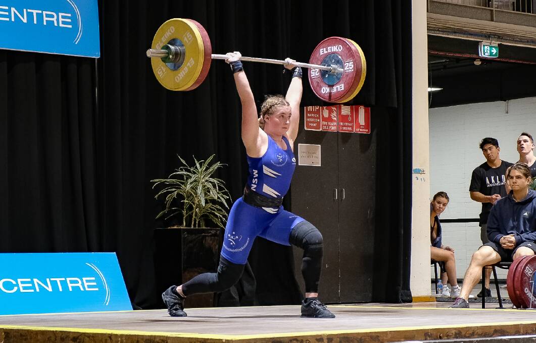 PROUD: Jae Daly showed her strength while doing the clean and jerk at the senior state championships. Photo: SUPPLIED 
