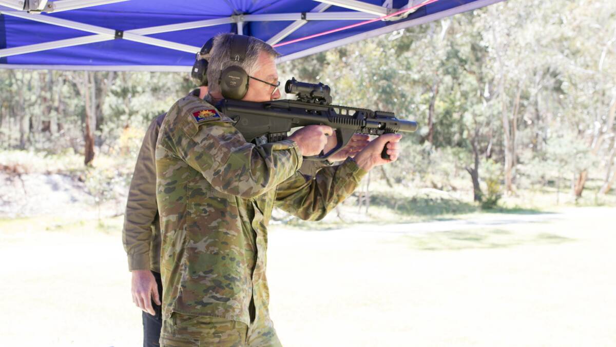  Australian Chief of Army LTGEN Rick Burr tests out the weapon on the range. Picture: SUPPLIED 