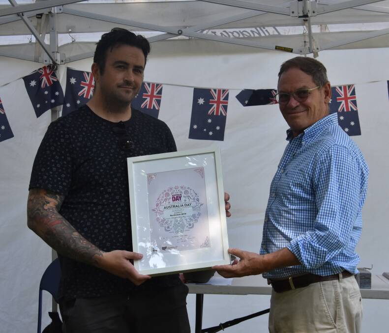 Resilience Festival organiser Greg McManus presented with his Outstanding Event of the Year award BY Scott McGregor. 