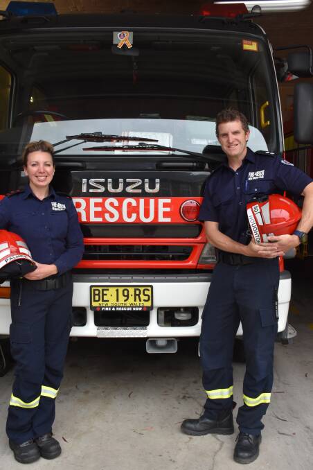 Captain Melanie Palmer and station officer Steven Houghton in front of the Fire and Rescue truck. Picture: CIARA BASTOW. 