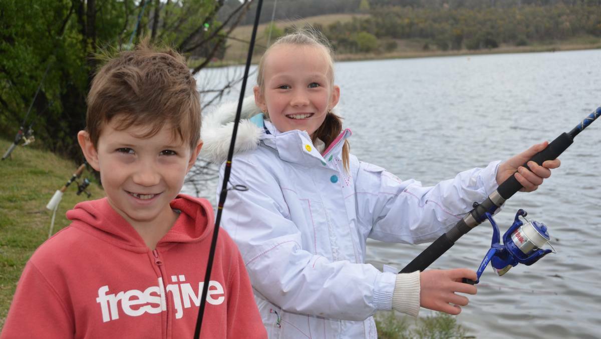 KEEN BEANS: Harry and Phoebe Milne getting among the action on Gone Fishing Day at Lake Wallace in happier times. 