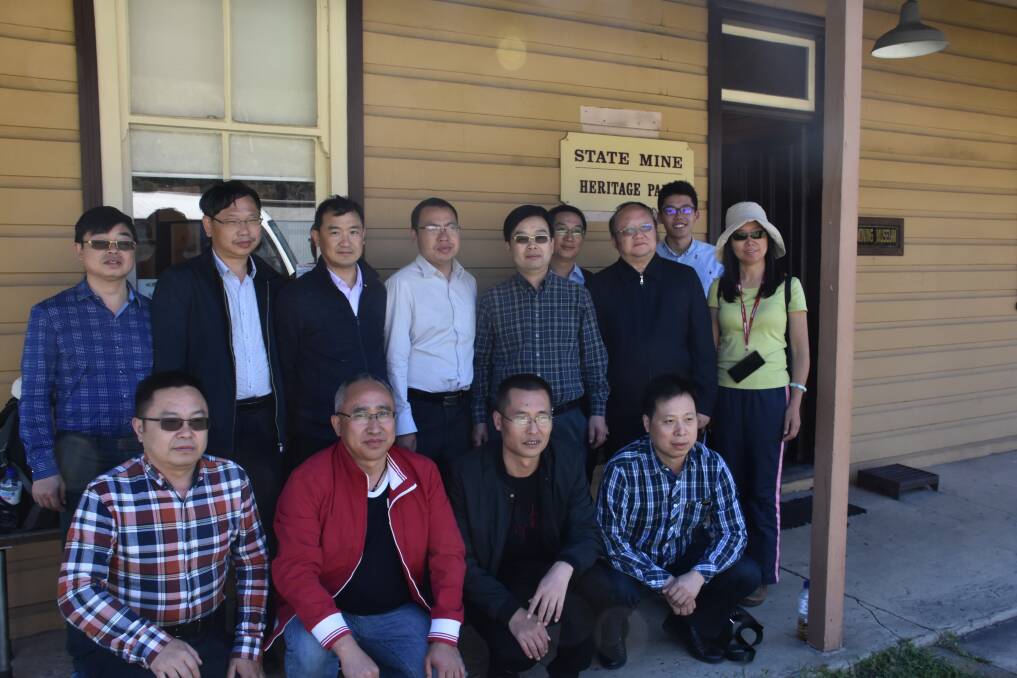 The Chinese men and women standing in front of the State Mine Heritage House. Picture: CIARA BASTOW. 