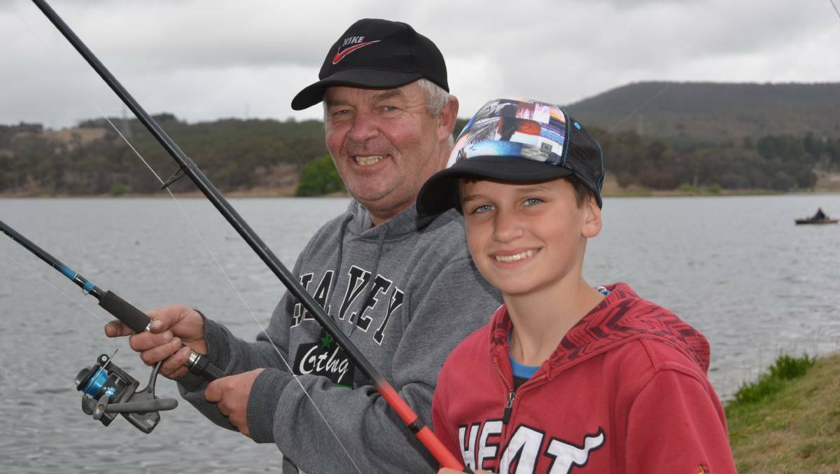 ACROSS THE GENERATIONS: Rod Atkins and grandson Connor Hoson trying their luck in 2017.  Picture: HOSEA LUY. 