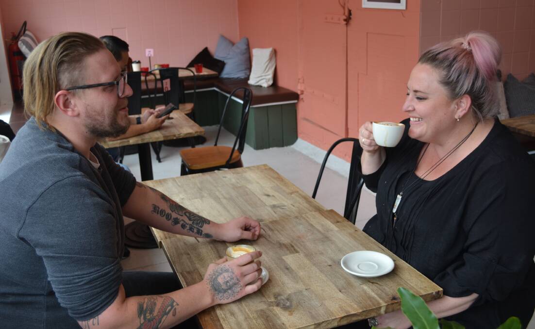 EMPLOYEES: Hometown Cafe employees enjoy a quiet moment before work. Picture: CIARA BASTOW 