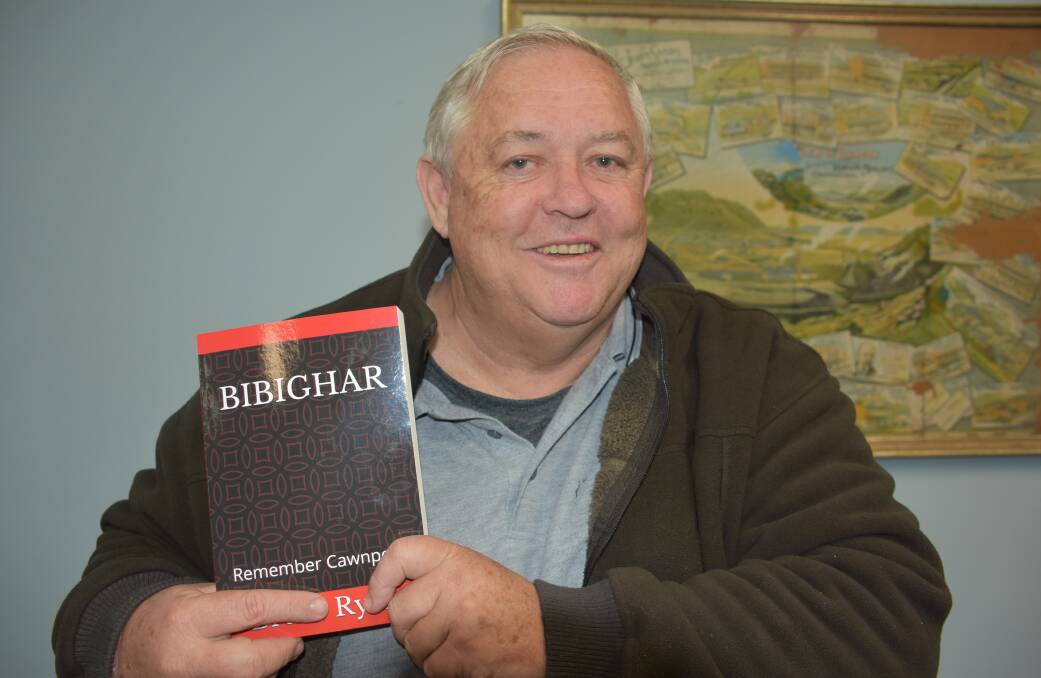 Bruce Ryan with his debut novel Bibighar: Remember Cawnpore. Picture: CIARA BASTOW. 