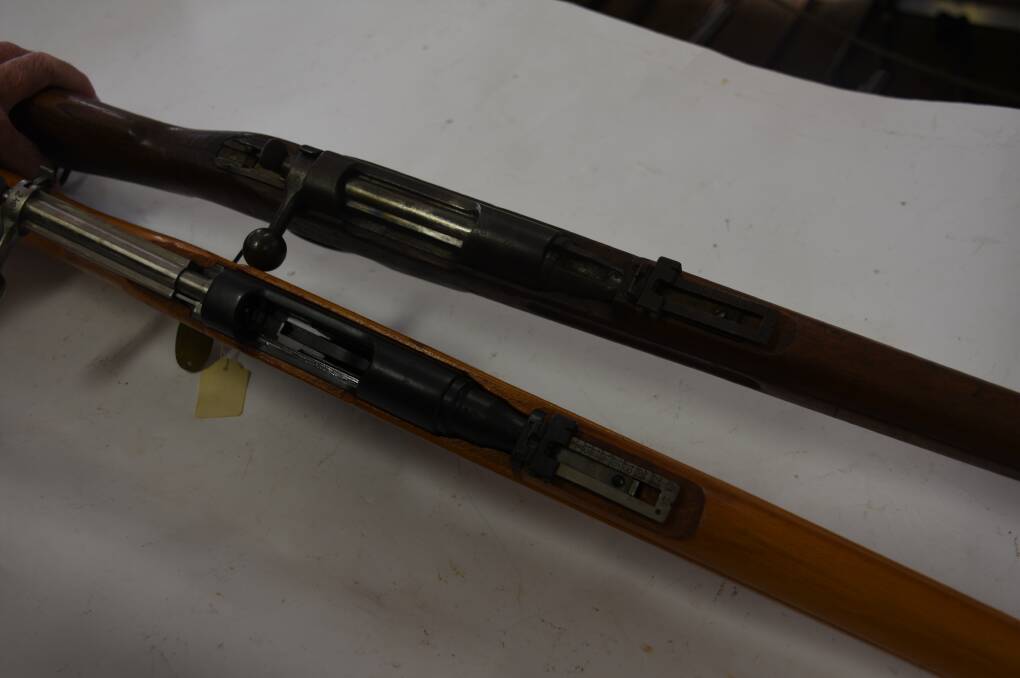 Two of the same weapons, except one has been welded shut and is 'permanently inoperable' and can't move or do anything. Picture: CIARA BASTOW. 