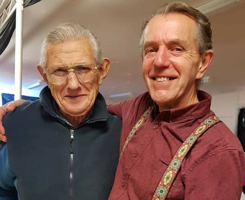 DANCE: Ron Murphy and Ross Yates braved the weather at the Country and Western night fundraiser. Picture: SUPPLIED. 
