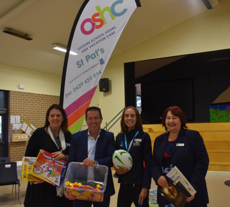 TOGETHER: OSHC Project Officer for Centacare Bathurst Narelle Howard, MP Paul Toole, Coordinator Melissa Stapleton with St Pat's principal Helen Mulholland. Picture: CIARA BASTOW