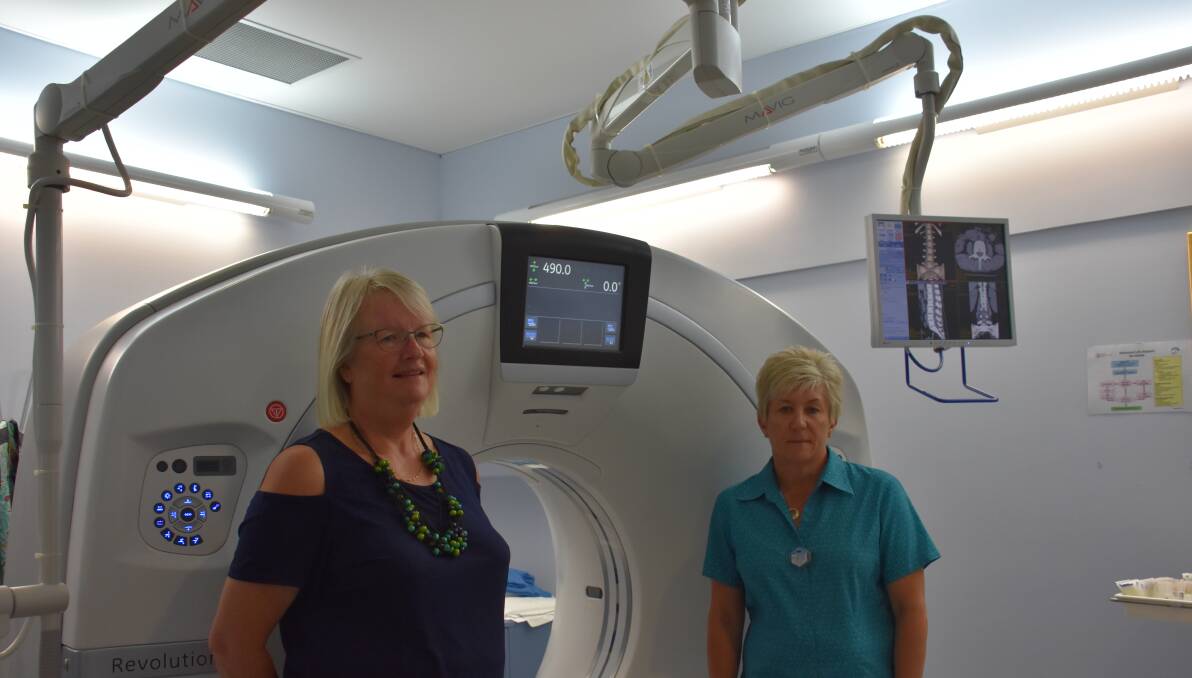 NEW TECHNOLOGY: Lithgow Hospital general manager Jill Marjoram and Chief Radiographer Michelle Bostock stand next to the new CT machine. Picture: CIARA BASTOW