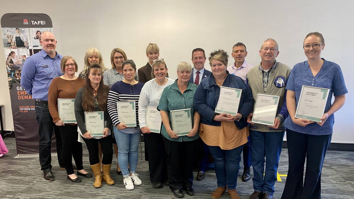 GRADUATION: MP Paul Toole at Lithgow TAFE with teachers,
representatives from Three Tree Lodge and its staff who graduated from the
Foundation Skills for Your Future course. 