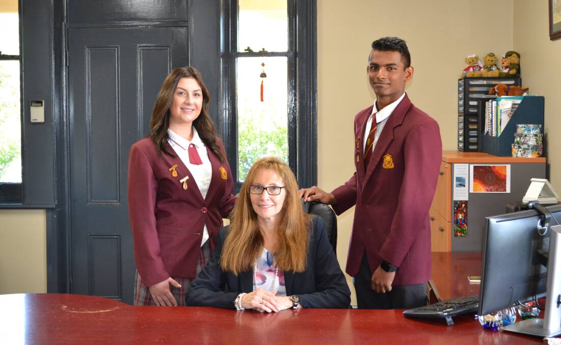 Joyce with our two school captains, Shannon O'Regan & Kiran Gajula (which was taken back in February). Picture: SUPPLIED 