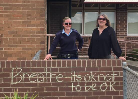 MENTAL HEALTH MONTH: RHAMP coordinator Sonia Cox is promoting mental health month with the help of Lithgow Council and local police officers. Photo: SUPPLIED 