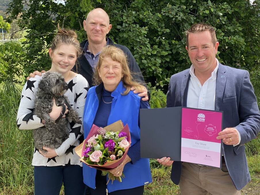 HIDDEN TREASURE: Member for Bathurst Paul Toole with Hidden Treasure Fay Shaw, her son Tony, granddaughter Amber and pampered pooch Rosie. Photo: SUPPLIED 