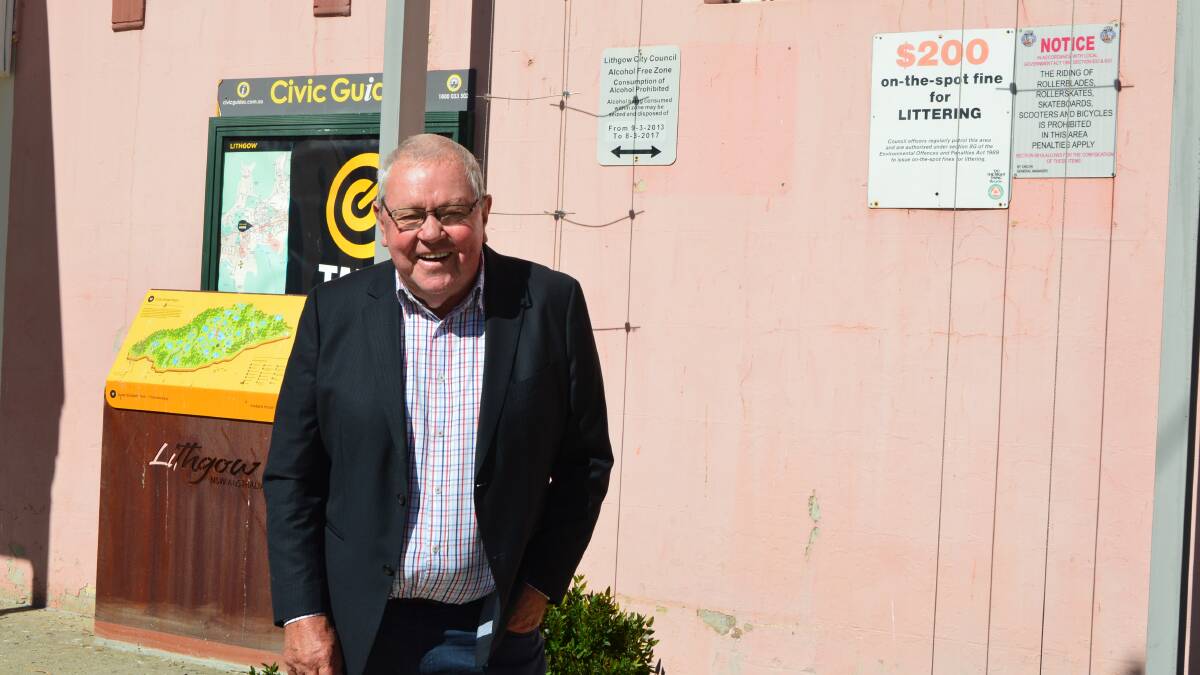 ALCOHOL FREE: Ray Thompson in front of an alcohol free zone in Cook Street Plaza. Photo: ALANNA TOMAZIN 