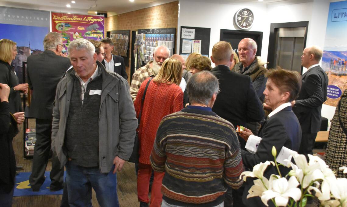 BUZZ: Lithgow Tourism members and attendees of the centre opening night. 