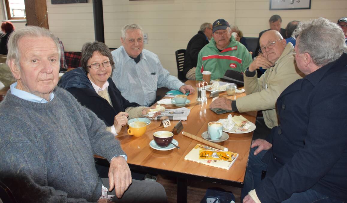 COFFEE AND CONSERVATION: Activists Jack and Judy Mundey with Dennis Falls, Mick Tubbs, Vince Ashton and Graham McLeod. Picture: PHOEBE MOLONEY