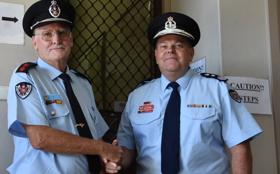 CONGRATULATIONS: Captain Paul Carter and NSW Fire and Rescue commissioner Paul Baxter. Picture: PHOEBE MOLONEY. 
