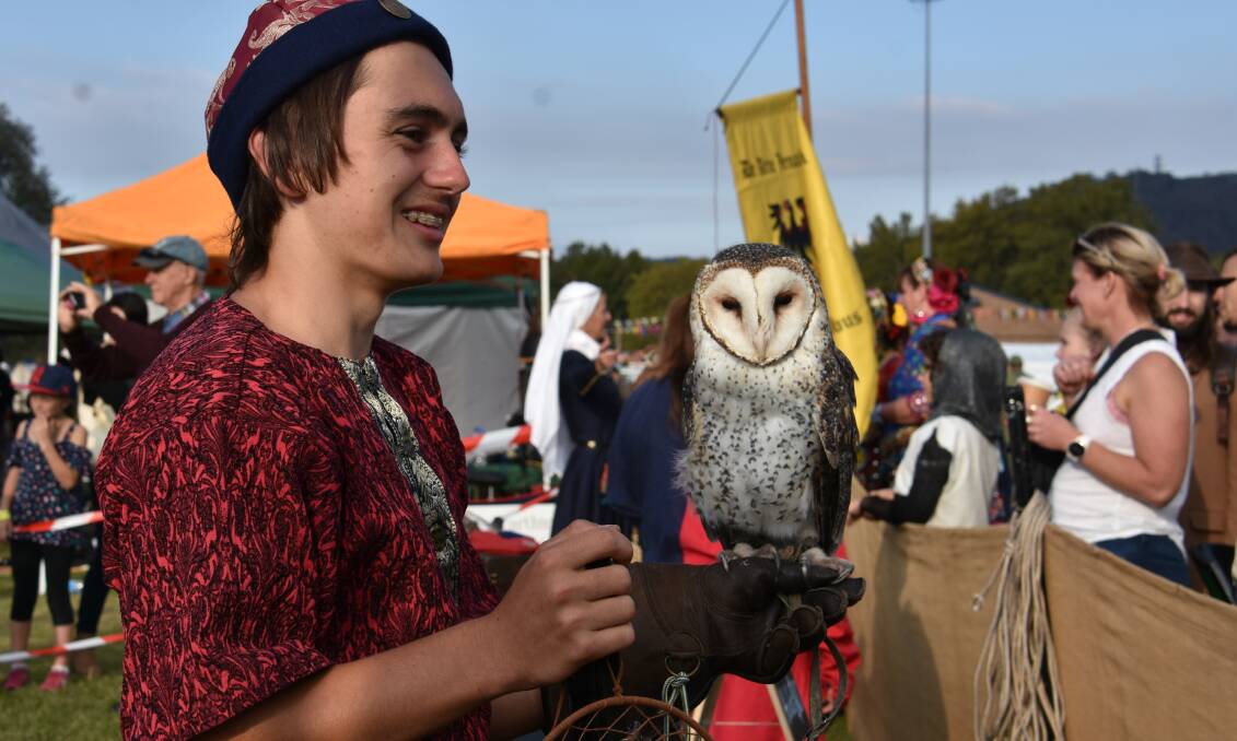 A HOOT: Ironfest broke the record of attendance this year. Spectators watch Jett Preis and his owl. Picture: PHOEBE MOLONEY. 