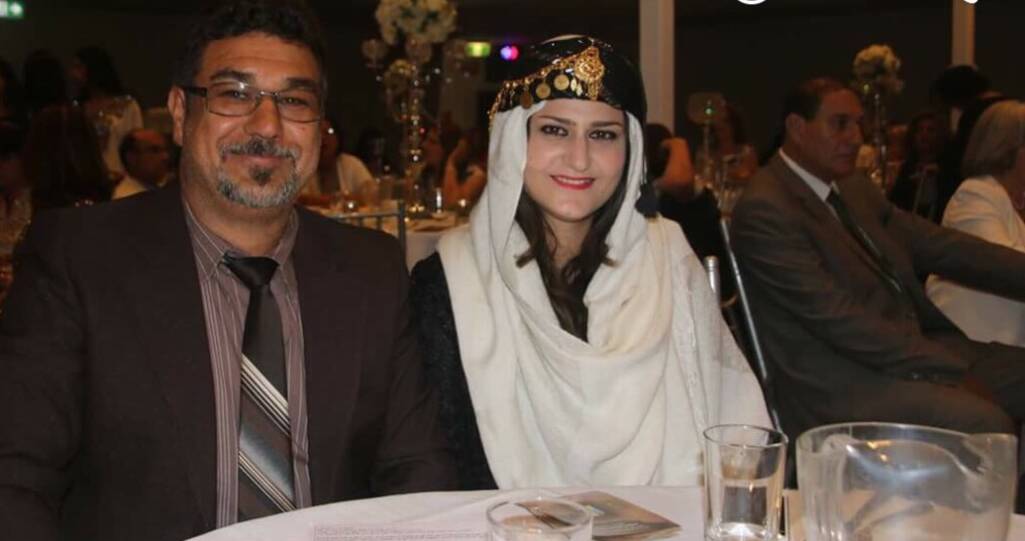 AWARDED: Salwa Bashar and her husband at the International Women's Day award ceremony.