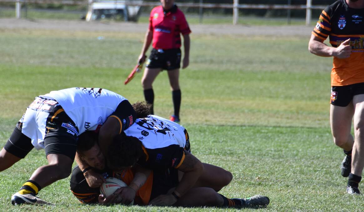 TACKLED: Oberon's defence was too strong for Workies' premier side. Picture: CIARA BASTOW