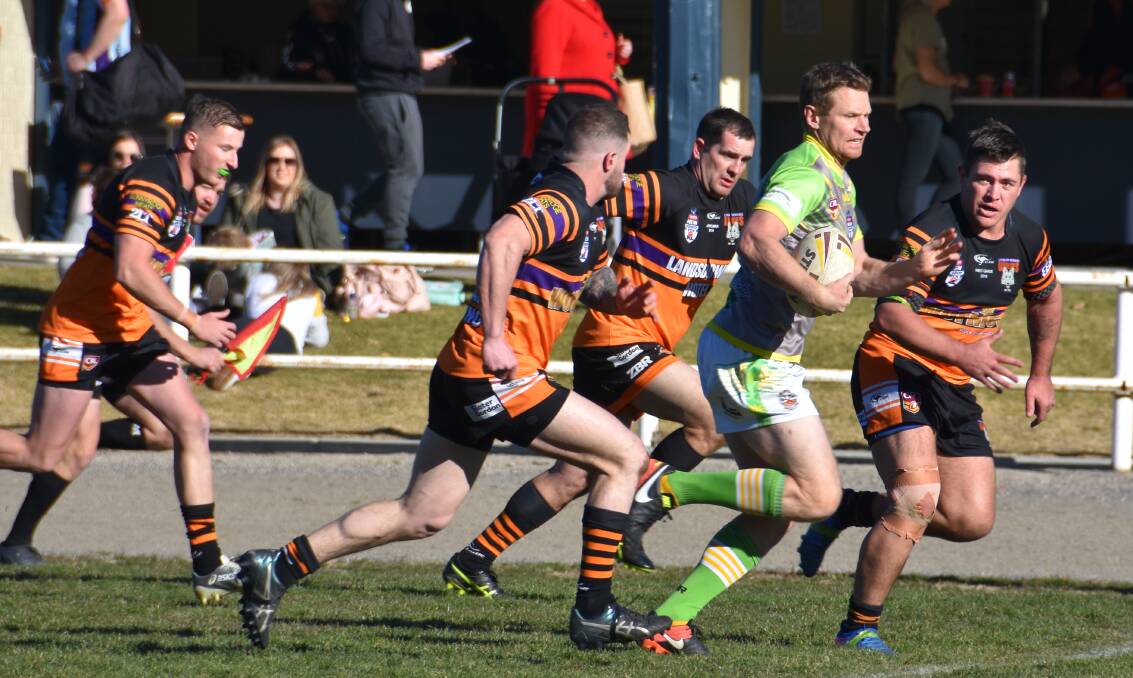 CHASE: Workies' Joe Bilby, Jono Van-Veen and Corey Willmott try to stop a CYMS breakout. Picture: PHOEBE MOLONEY