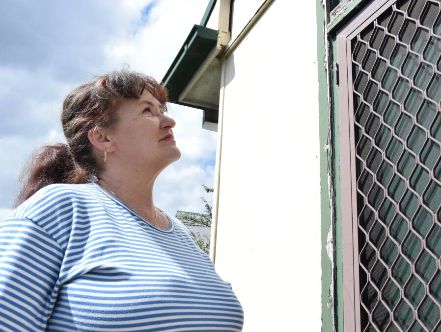 THE BIG WAIT: Leeanne Jackson waited two years for FACS maintenance to replace her rotten door but they didn't replace the frame. Picture: PHOEBE MOLONEY. 