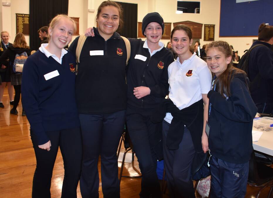 GREAT DAY: The Mudgee High School team with Lithgow High School student Tyra Govan. Picture: PHOEBE MOLONEY.