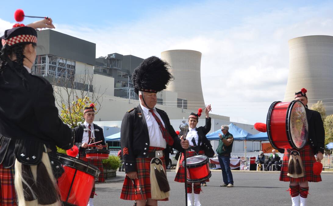 GENERATOR: Lithgow Highland Pipe Band playing at Mt Piper Power Station's 25th anniversary celebrations. Picture: PHOEBE MOLONEY. 