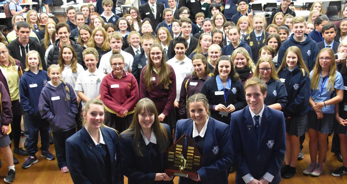 SPEAK UP: The more than 100 students who participated at Lithgow High School's 'Festival of Speech' standing with the Marie Brennan Memorial Trophy. Picture: PHOEBE MOLONEY. 