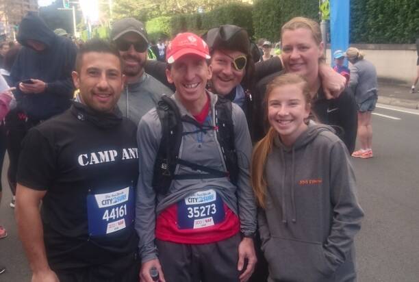 GOING THE DISTANCE: Tomislav King, Craig Cutting, Andrew and Tabitha Neville, Joanne Curran and an unknown City2Surf competitor/pirate who jumped in the picture. Picture: SUPPLIED. 