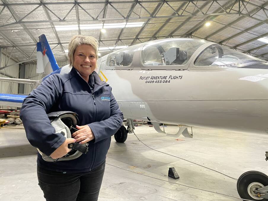 Tammy Camilleri at Bathurst Airport with an L-39 jet. She and husband Charlie will compete in the L-39's predecessor, the L-29, at Reno in the US this year.