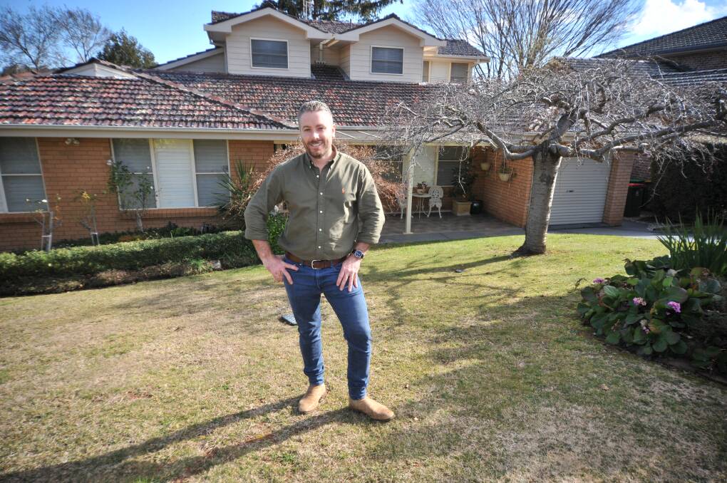 BUOYANT MARKET: Real estate agent Peter McCormack at a Larela Circuit house which sold for close to $1 million this week. Photo: JUDE KEOGH