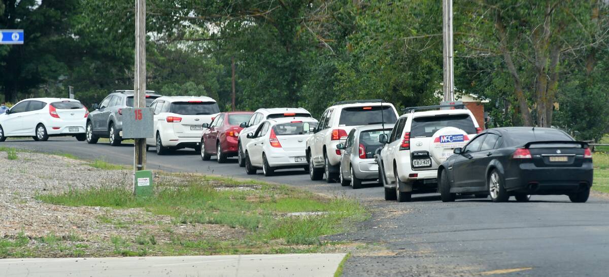 LINE UP: Cars queue for COVID-19 testing in Orange on Monday. Photo: CARLA FREEDMAN