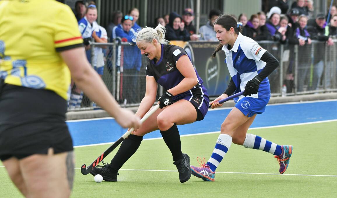 Lithgow Panthers captain Millie Leard, pictured being pressured by Sophie Conroy, scored just 45 seconds into Saturday's grand final. Picture by Chris Seabrook