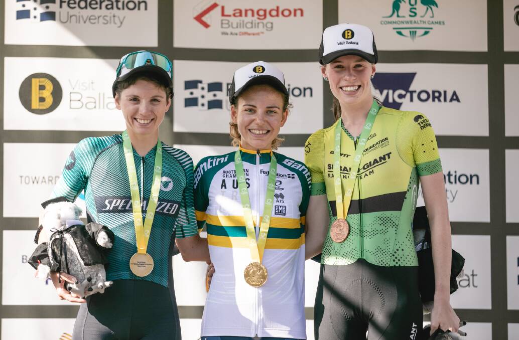 PROUD MOMENT: Emily Watts (right) with her under 23s time trial bronze medal. Photo: HIKARI MEDIA