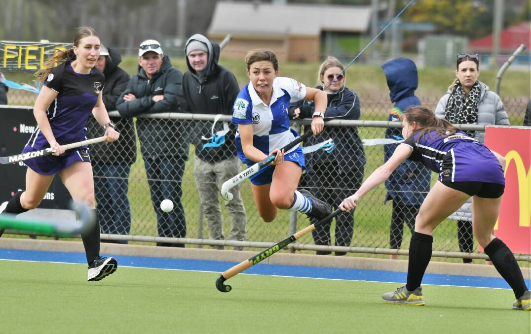 Saints talent Lily Kable is knocked off her feet in Saturday's grand final against Panthers. Picture by Chris Seabrook