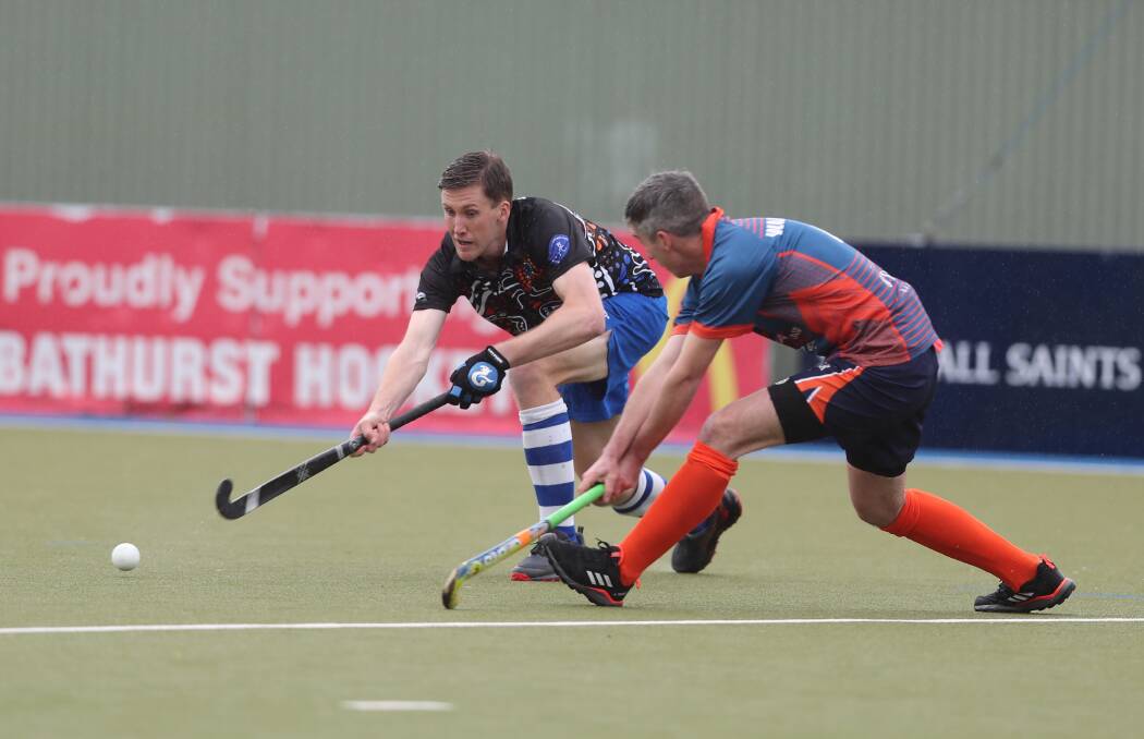 FORM SIDE: Saints talent Cameron Liles fires a pass off to a team-mate during Saturday's clash with Orange Wanderers. The Saints won that match 6-0 to make it five victories on the trot. Photo: PHIL BLATCH