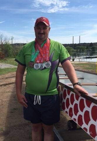 A MEMBER OF THE "MOTLEY CREW": Grant Tattersall with the medals he won at the Pacific Masters Games held on the Gold Coast earlier this month. Photo supplied.