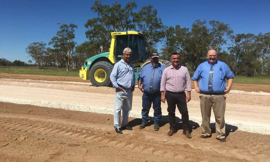 Cr Tom Stanton (left) with Brewarrina Shire Mayor Phillip O'Connor, then Deputy Premier John Barilaro and council general manager Jeff Sowiak earlier last year when the state government announced funding for the final section of the Brewarrina to Queensland border. Photo: Brewarrina Shire Council.